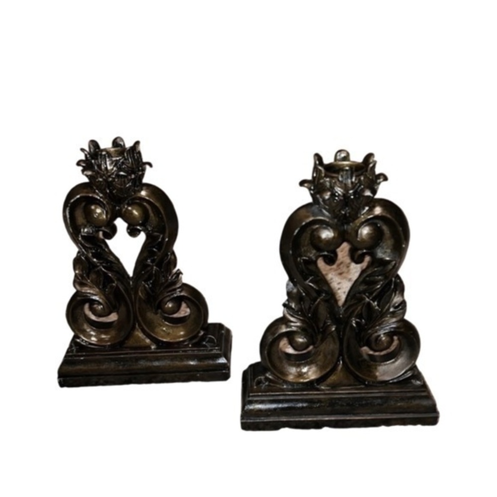 Porcelain ornamental decorative taper candle holders.